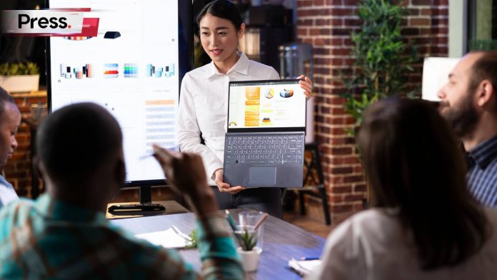 asian woman presenting a pr proposal at a pr agency
