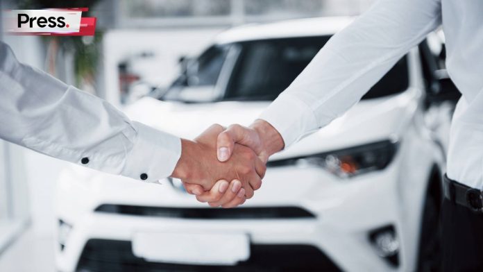 sales man selling car after car loan approval in malaysia