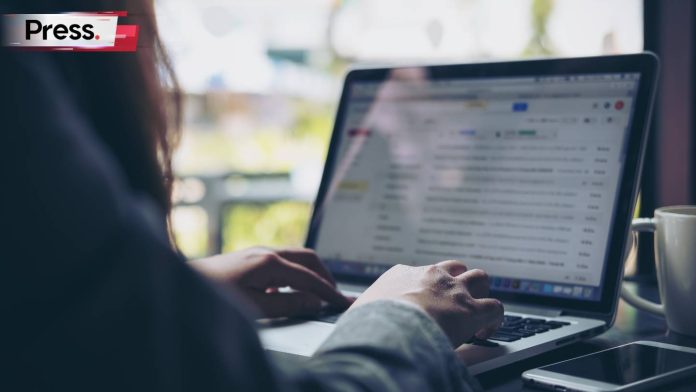 woman sending email job application in Malaysia