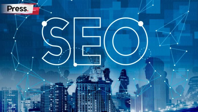 An image of a blue-colored cityscape with the word 'SEO' looming over it in large letters, which showcases the purpose of this article to highlight SEO vs AEO.