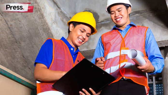 Malaysian contractor and foreman making sure everything is safe