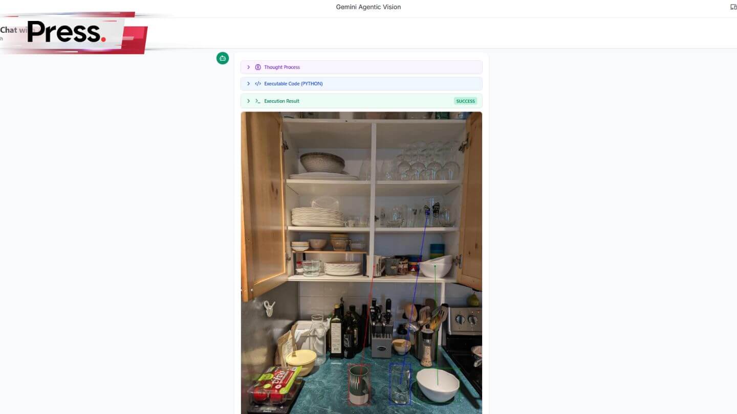 Open kitchen cabinet filled with organized plates, bowls, and glassware above a busy countertop.