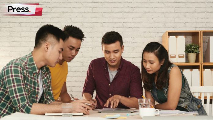 A group of Malaysian students studying while waiting for their SPM results