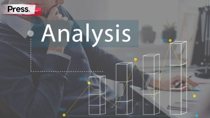 A businessman sits at his desk, with a graph and the word 'analysis' in the foreground. This represents analysis of competitors and a target market.
