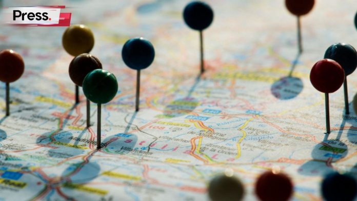 A map with pins in it to indicate specific locations, depicting SEO localization.