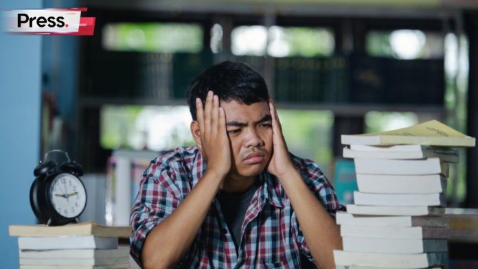 A student looking glum, as he thinks about whether to change his university course