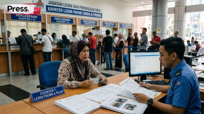 A woman applying for a signboard license at a Malaysian government office counter with official documents and staff.