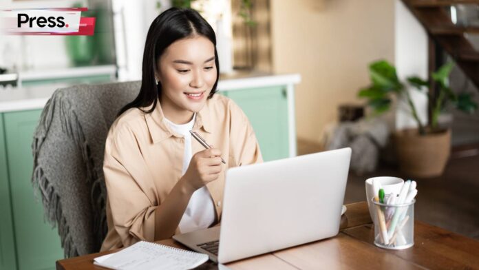 asian woman working from home with fwa