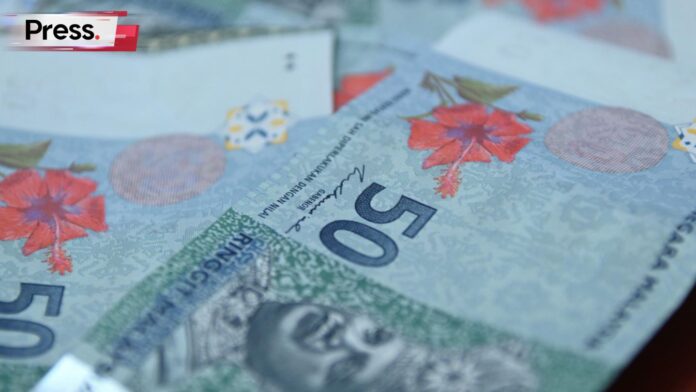 Photo of Malaysian banknotes, representing salary