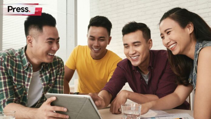 Photo of students studying and discussing stuff, representing the MUET vs IELTS debate